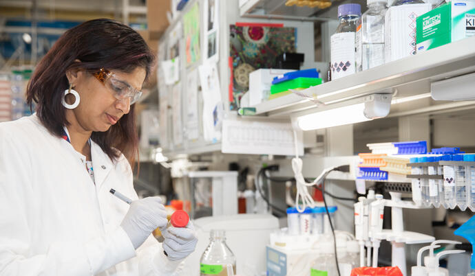 researcher writing on sample